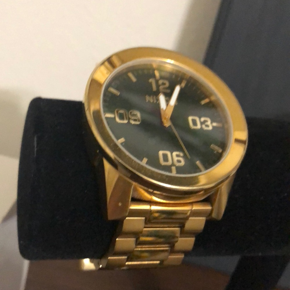 Gold Nixon For Sale